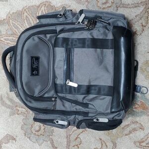 An Original Penguin Odell 9 pocket laptop backpack